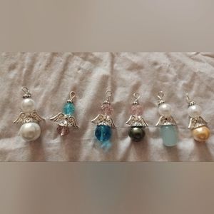 I'm selling Angel pendants.
